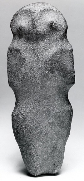 Basaltic sculptural stone figure